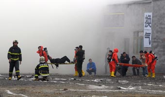 Chiny: 21 ofiar pożaru wieżowca